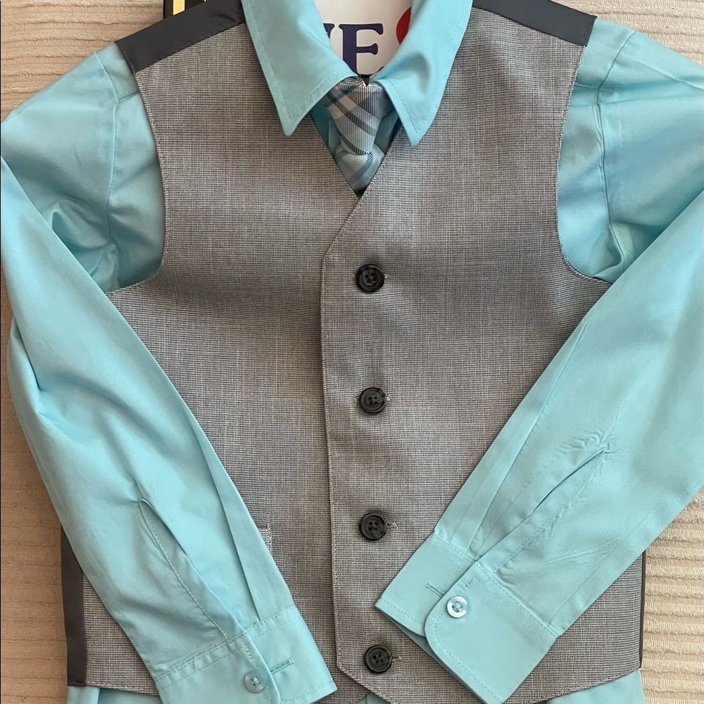 Dress shirt (teal), matching neck tie (teal plaid), light gray vest